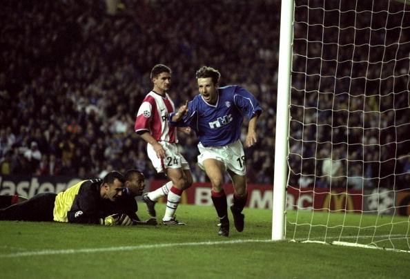 20 Oct 1999:  Neil McCann celebrates his goal for Rangers against PSV Eindhoven in the UEFA Champions League  Group F match at Ibrox in Glasgow. Ra...