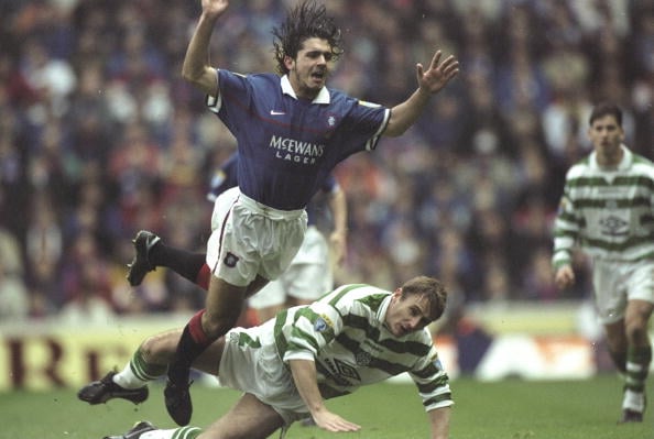 8 Nov 1997:   Rino Gattuso of Rangers takes a dive off Tommy Boyd of Celtic's challenge during the Bells Scottish Premiership match at Ibrox in Gla...
