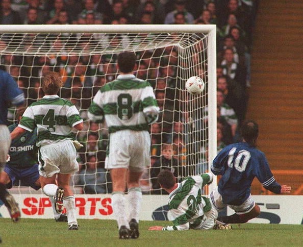 30 OCT 1994:  MARK HATELEY OF RANGERS, NUMBER 10, LEAVES THE CELTIC DEFENCE BEHIND TO SCORE FOR RANGERS IN THEIR SCOTTISH PREMIER LEAGUE MATCH IN G...