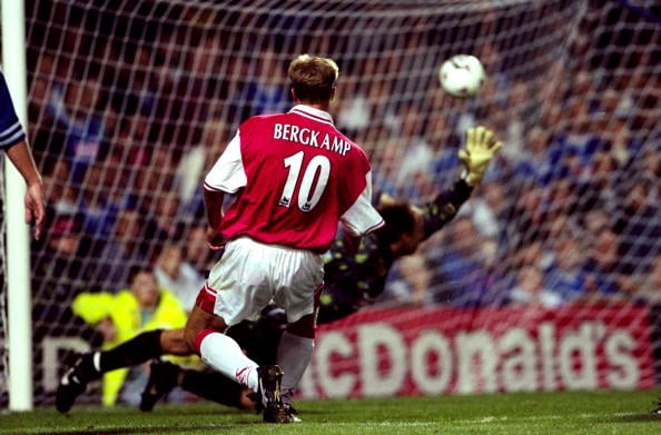 27 Aug 1997:  Dennis Bergkamp of Arsenal beats Kasey Keller in the Leicester City goal to score the late equaliser in the FA Carling Premiership ma...