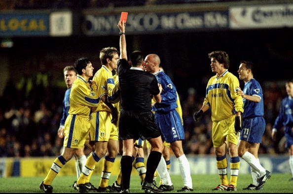19 Dec 1999:  Frank Leboeuf (#5) of Chelsea is shown the red card by referee Jeff Winter following a stamping incident during the FA Carling Premie...
