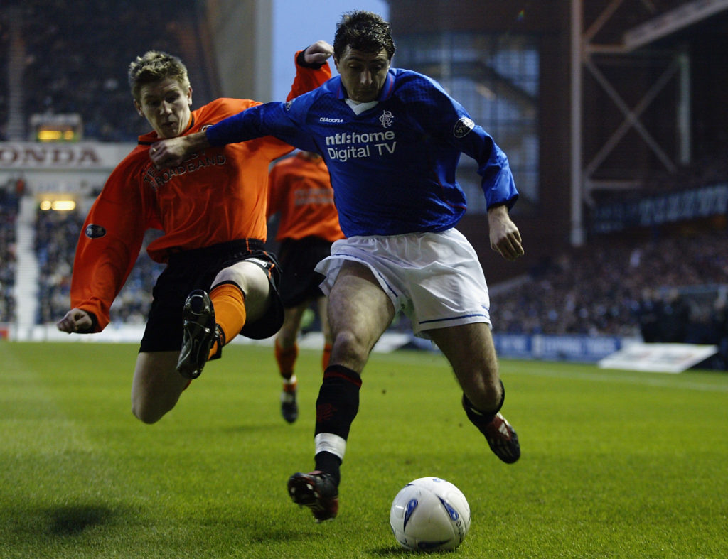 Shota Arveladze of Rangers and Jamie McCunnie of Dundee United
