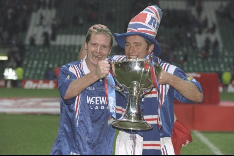 18 Nov 1996:  Paul Gascoigne (left) and teammate Ally McCoist pose with the trophy after the Scottish Coca Cola cup final between Rangers and Heart...