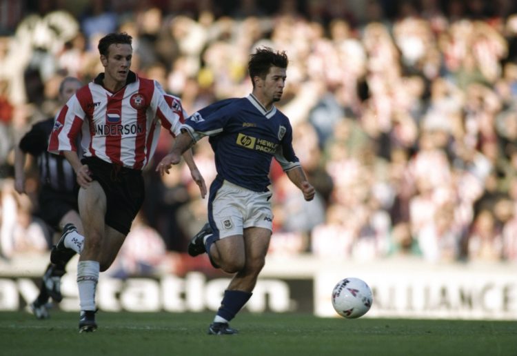 25 Oct 1997:  Jose Dominguez of Tottenham Hotspur takes on the Southampton defence during the FA Carling Premiership match at White Hart Lane in Lo...