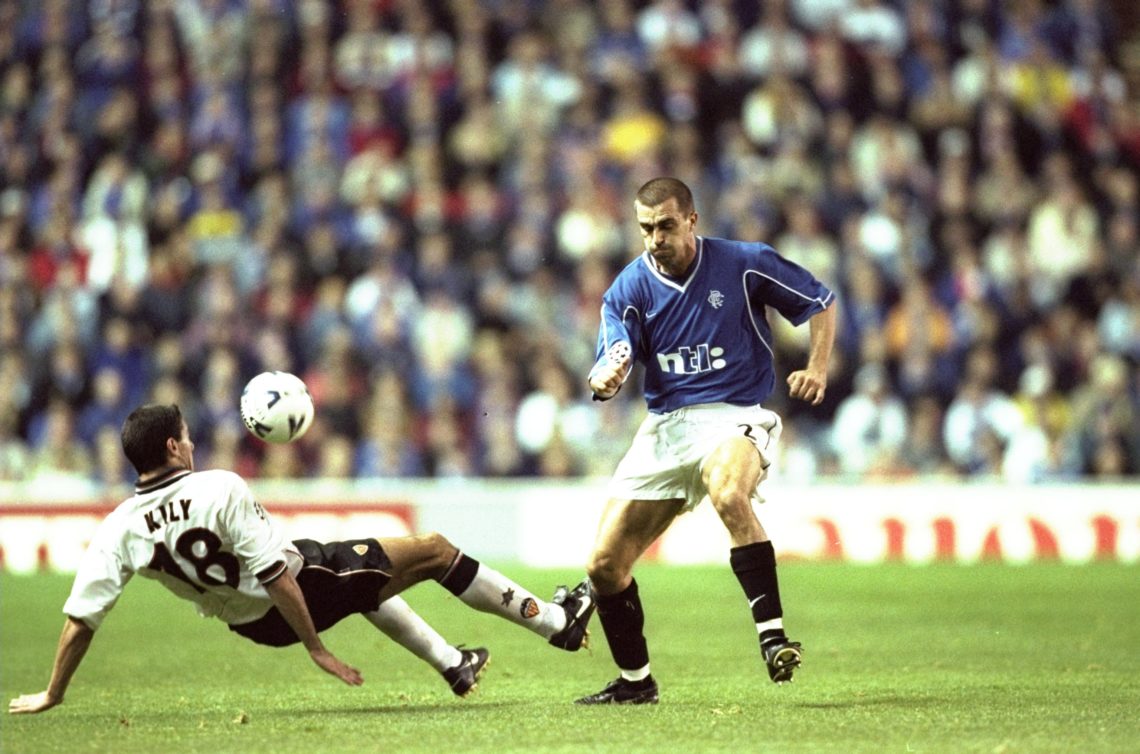 26 Oct 1999: Sergio Porrini of Rangers is tackled by Kily Gonzalez of Valencia during the Champions League match played at Ibrox Stadium in Glasgo...