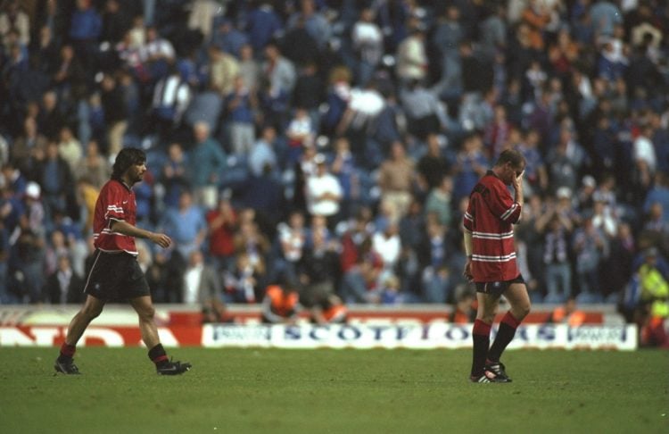 13 Aug 1997:  Paul Gascoigne (right) and Marco Negri of Rangers  walk off the field after the first leg of the Champions League match against IFK G...