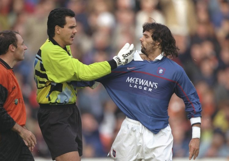 25 Oct 1997:  Dundee Utd goalkeeper Sieb Dykstra (centre) confronts Marco Negri of Rangers during a Scottish Premier League match at Tannadice Park...