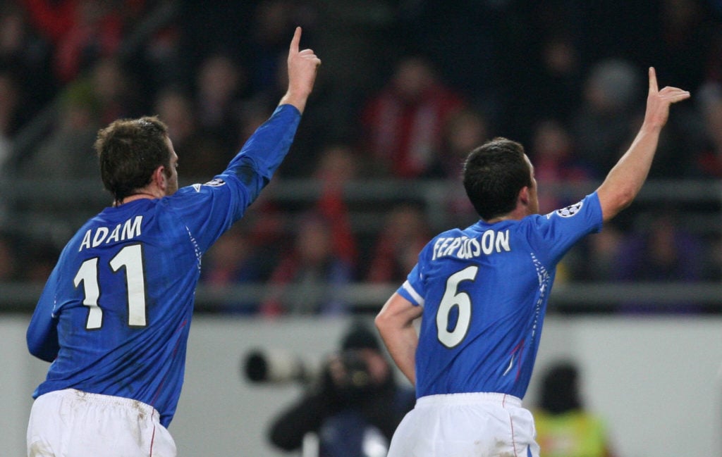 Rangers' midfielder Charles Adam (L) and