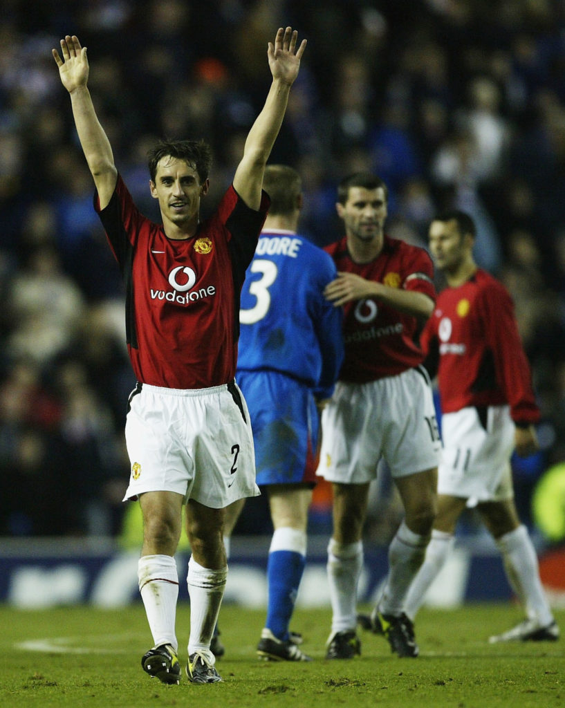 Gary Neville of Man Utd salutes the fans