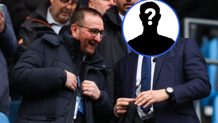 Kevin Thelwell laughing alongside an obscured image of Sean Dyche.
