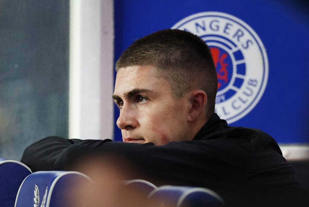 Bailey Rice looks on.